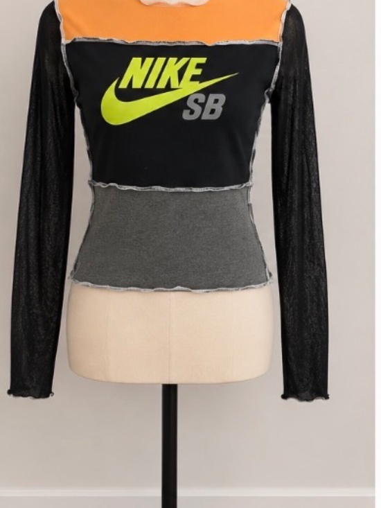 Tops - Vintage hand made Nike crop top with mesh sleeves.
